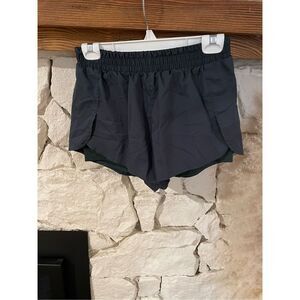 Girlfriend Collective green lined active shorts size S